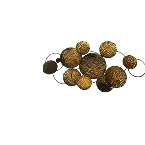 Handcrafted Brass Wall Motive – Artistic Metal Décor Accent
